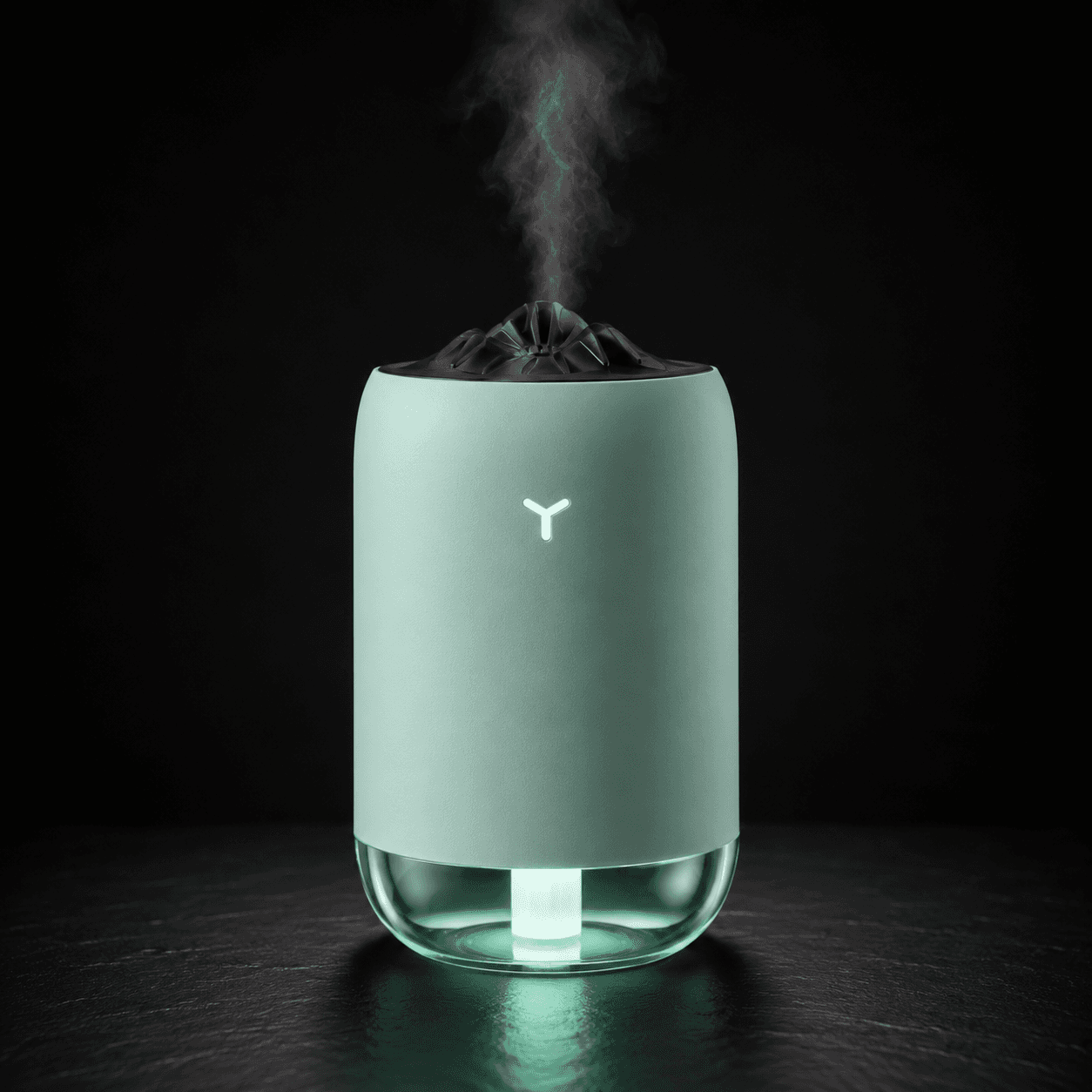Vomando FlameMist humidifier in light blue with glowing teal base